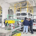 Dos unidades de línea de transporte, paletizado y ensacado automático de alimentos para mascotas de 25 kg comienzan a funcionar en la fábrica de nuestro cliente.